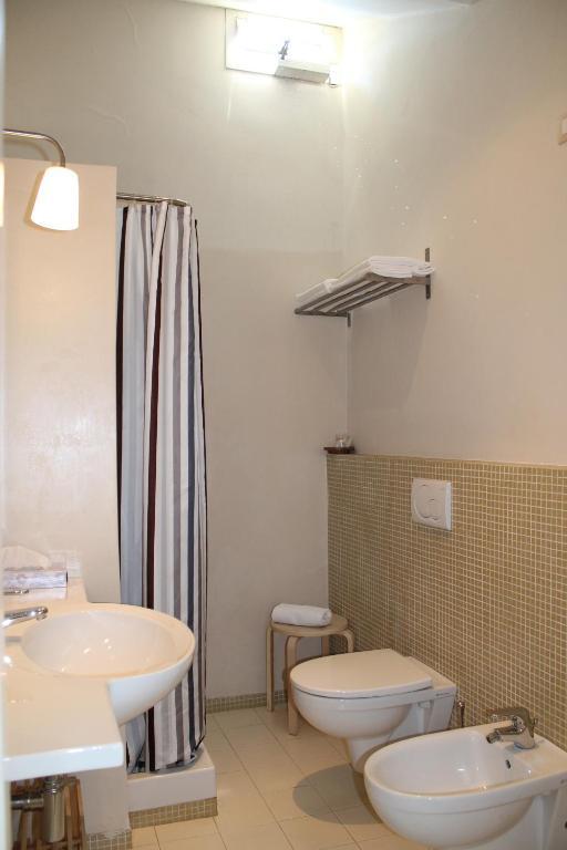 Hotel Touring Ливорно Номер фото